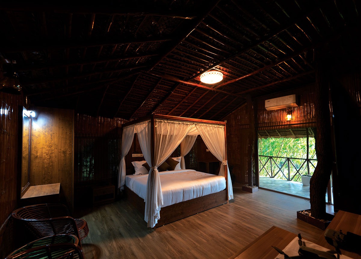 Bamboo Hut bedroom opening to the balcony
