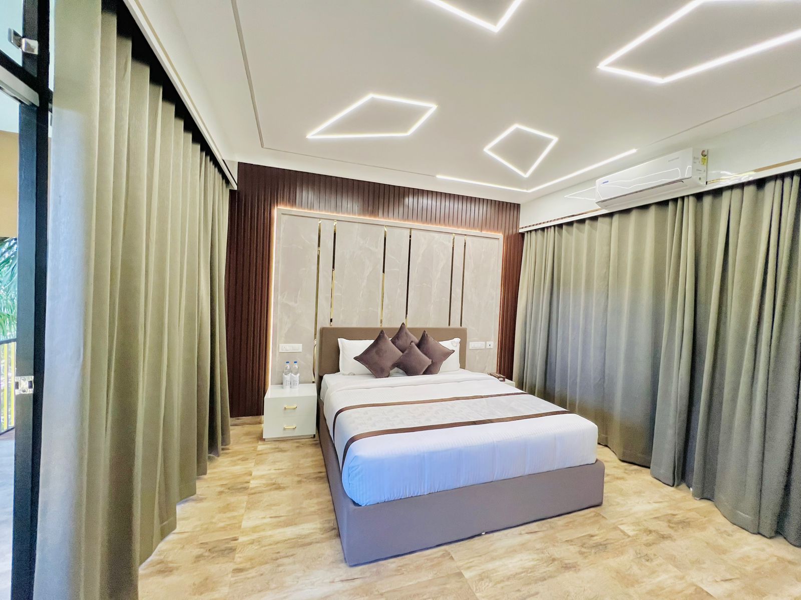 Tree House bedroom with designer ceiling lighting